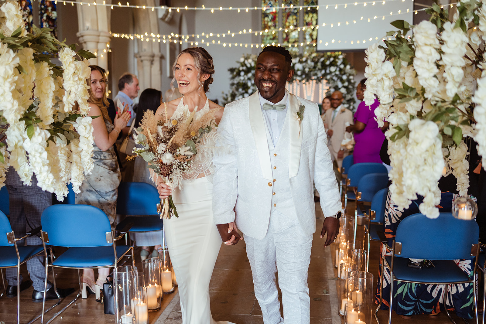 Couple walkind down the isle after wedding in Southampton ceremony