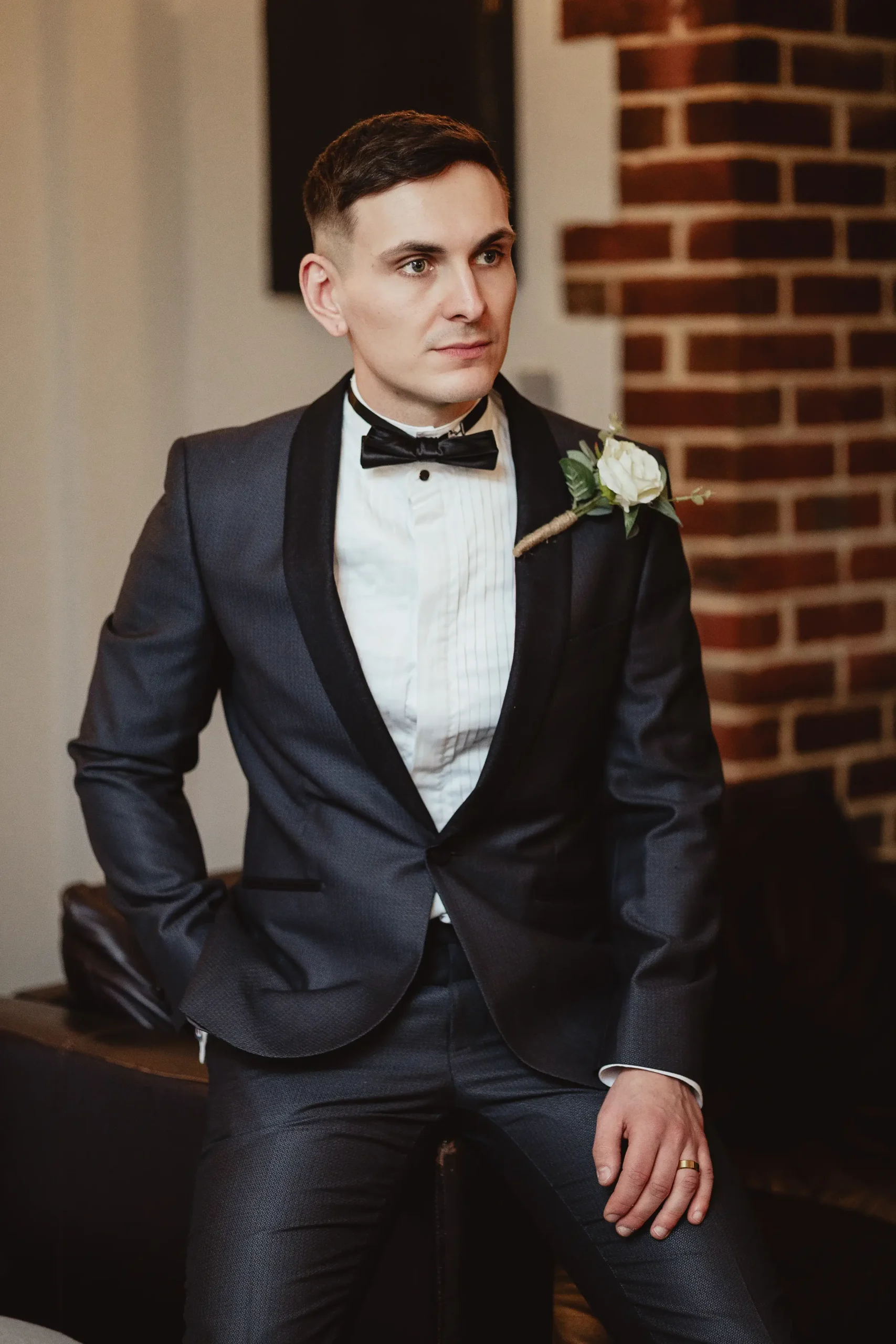 Groom in navy tuxedo with black shawl lapel at Ampfield Golf Club wedding reception Hampshire