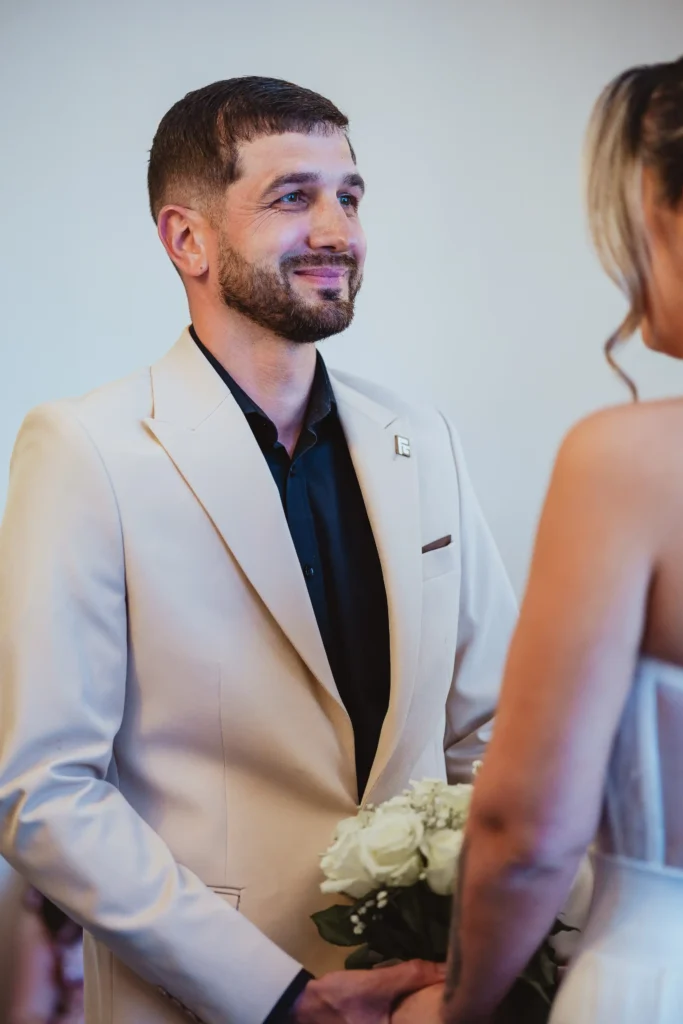 Intimate wedding ceremony at Guildford Registry Office, natural light, documentary wedding photography Surrey