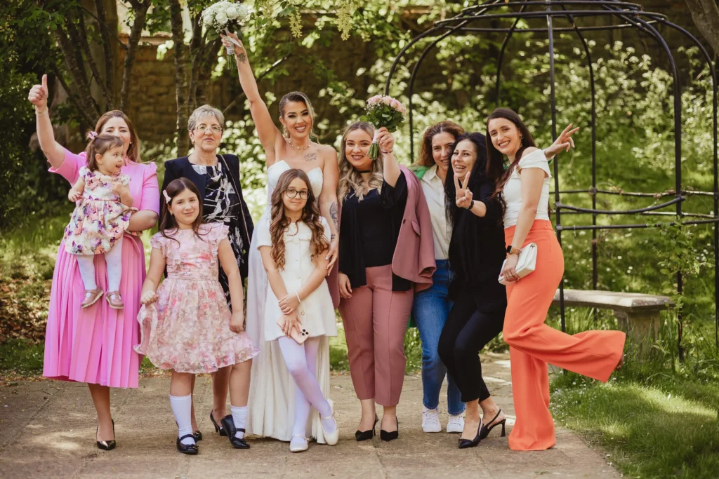 Wedding guests in the garden of Guildford Registry Office after the ceremony, Guildford wedding photographer