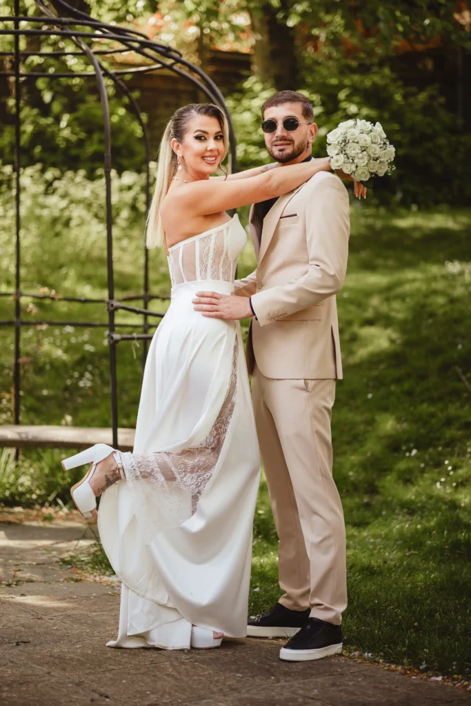 Couple walking in grounds of Artington House Guildford, natural light wedding photographer



