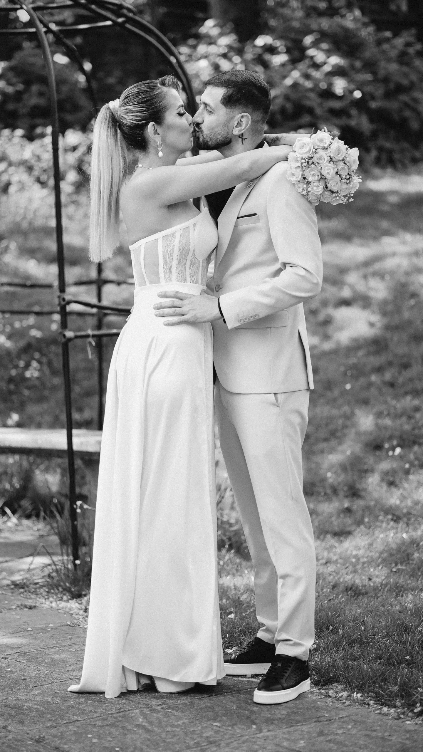 Couple sharing first kiss at Guildford Registry Office wedding ceremony, photographed by VasPHotography, Guildford wedding photographer