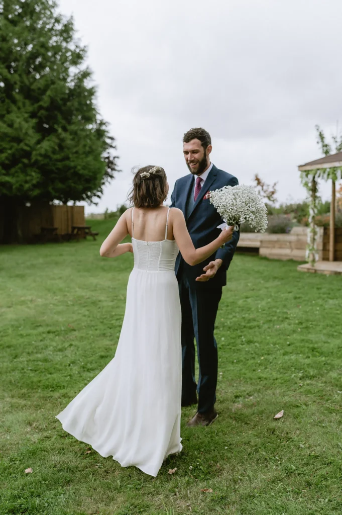 bride and groom having alone moment at The Angel Hotel, Alton, Hampshire — candid wedding photography by VasPhotography